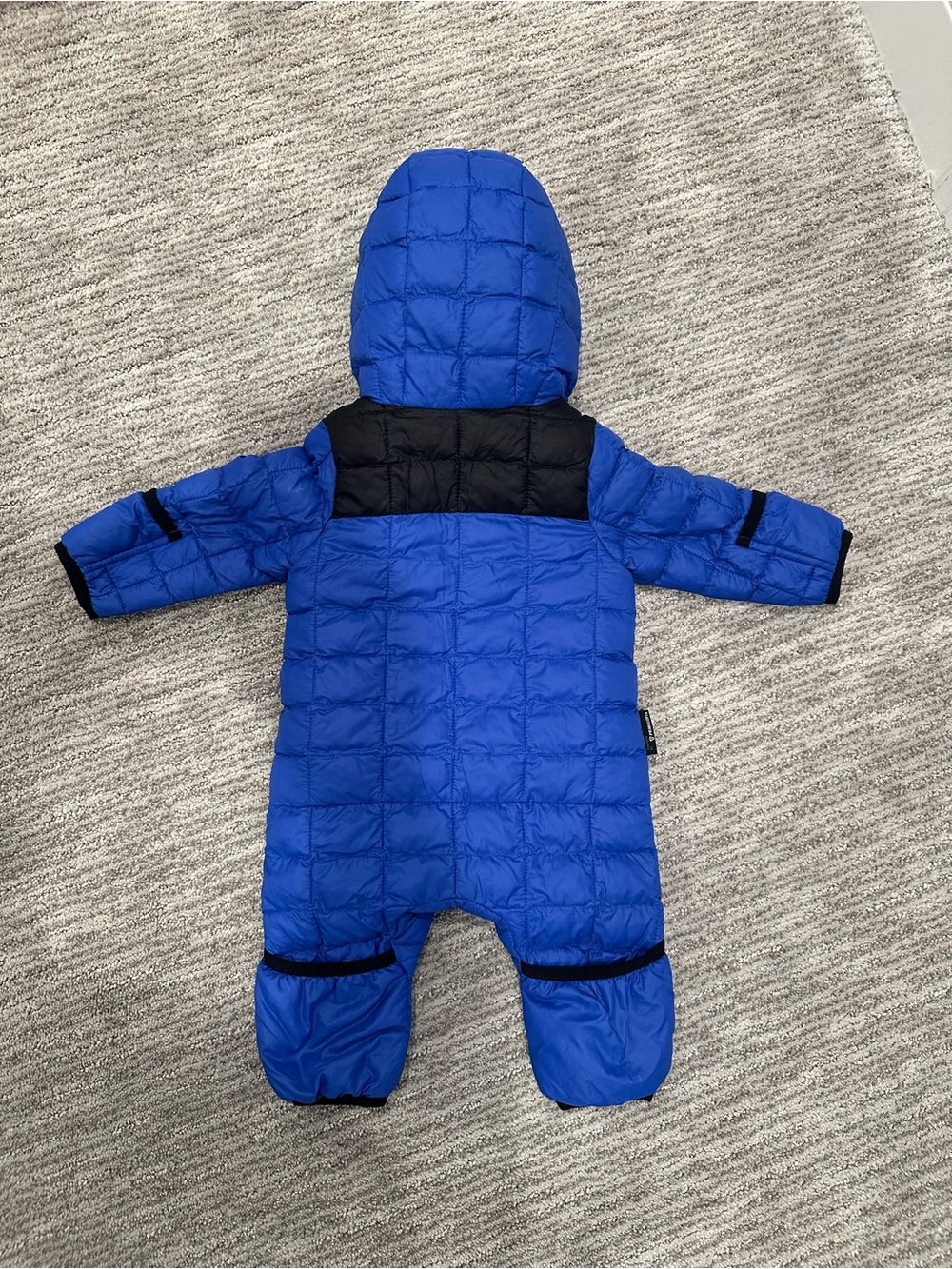 The North Face Blue and Black Quilted Hooded Baby One-Piece